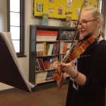 student playing violin