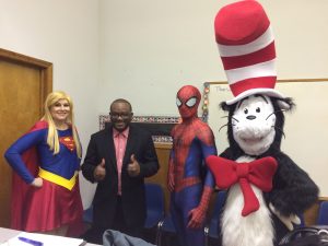 Mr. Reese with cat in the hat, spiderman, supergirl